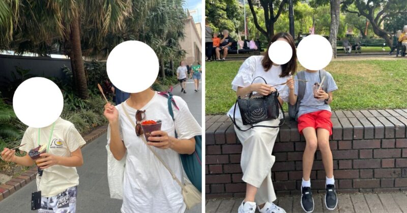 シドニーのサーキュラーキーのベンチでOakberry Acaiのテイクアウトを食べる親子